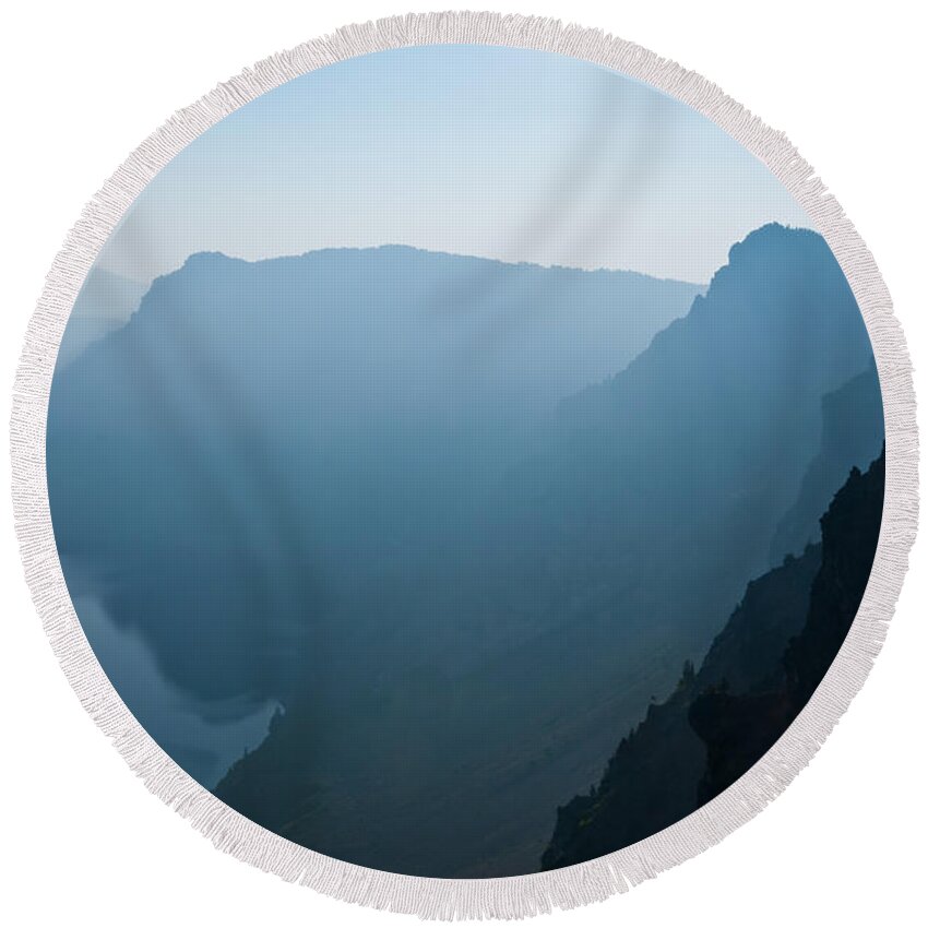Awe Round Beach Towel featuring the photograph Early Morning Fog Over Crater Lake by Jeff Goulden