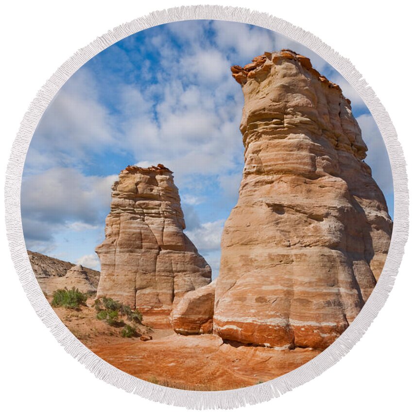 Arid Climate Round Beach Towel featuring the photograph Elephant's Feet Rock Formation by Jeff Goulden