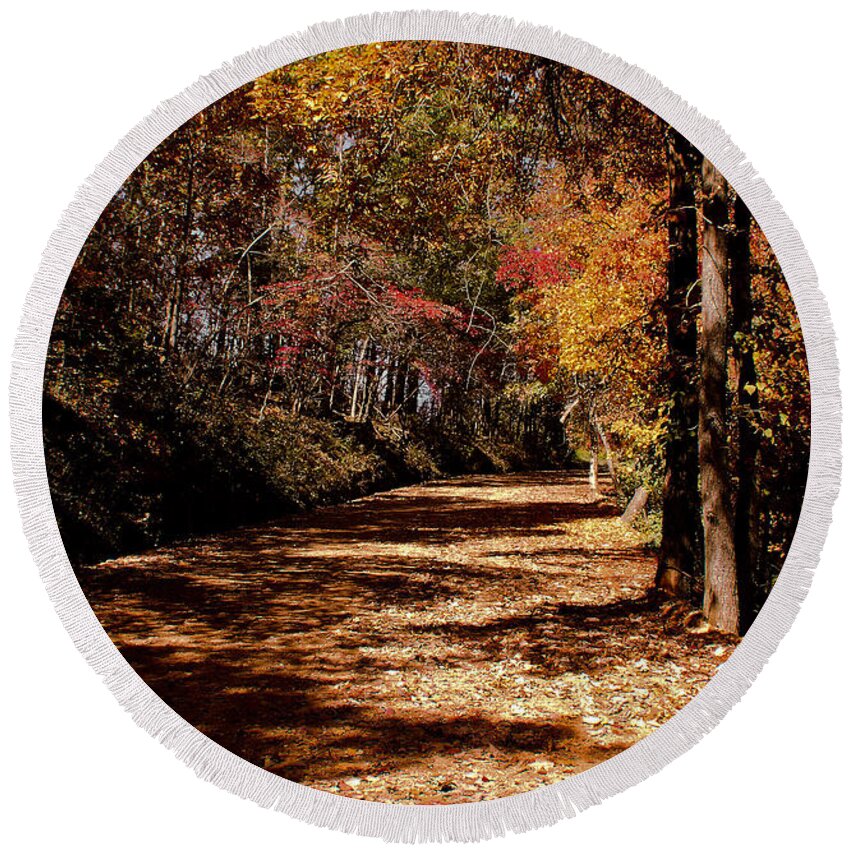 Nature Round Beach Towel featuring the photograph Fall On A Dirt Road by Robert Frederick