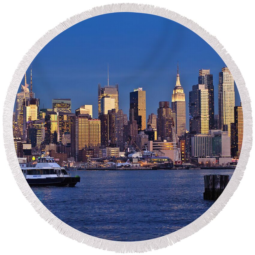 Best New York Skyline Photos Round Beach Towel featuring the photograph Ferry past Manhattan by Mitchell R Grosky