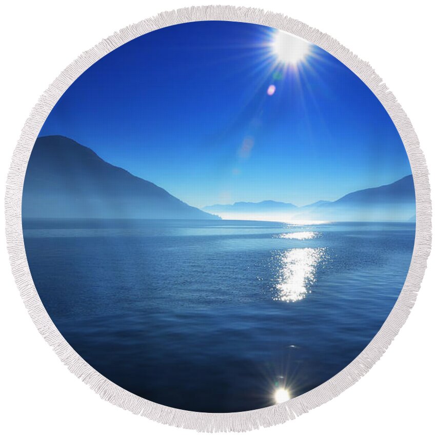 Lake Round Beach Towel featuring the photograph Foggy lake with sun by Mats Silvan