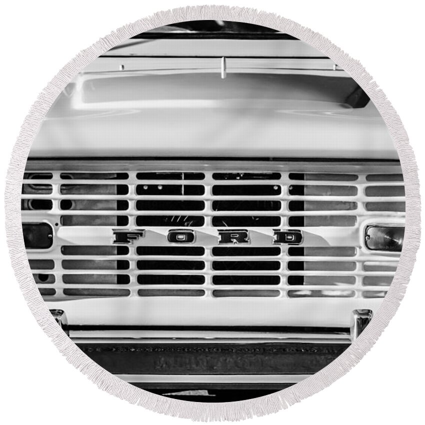 Ford Bronco Grille Emblem Round Beach Towel featuring the photograph Ford Bronco Grille Emblem -0014bw by Jill Reger
