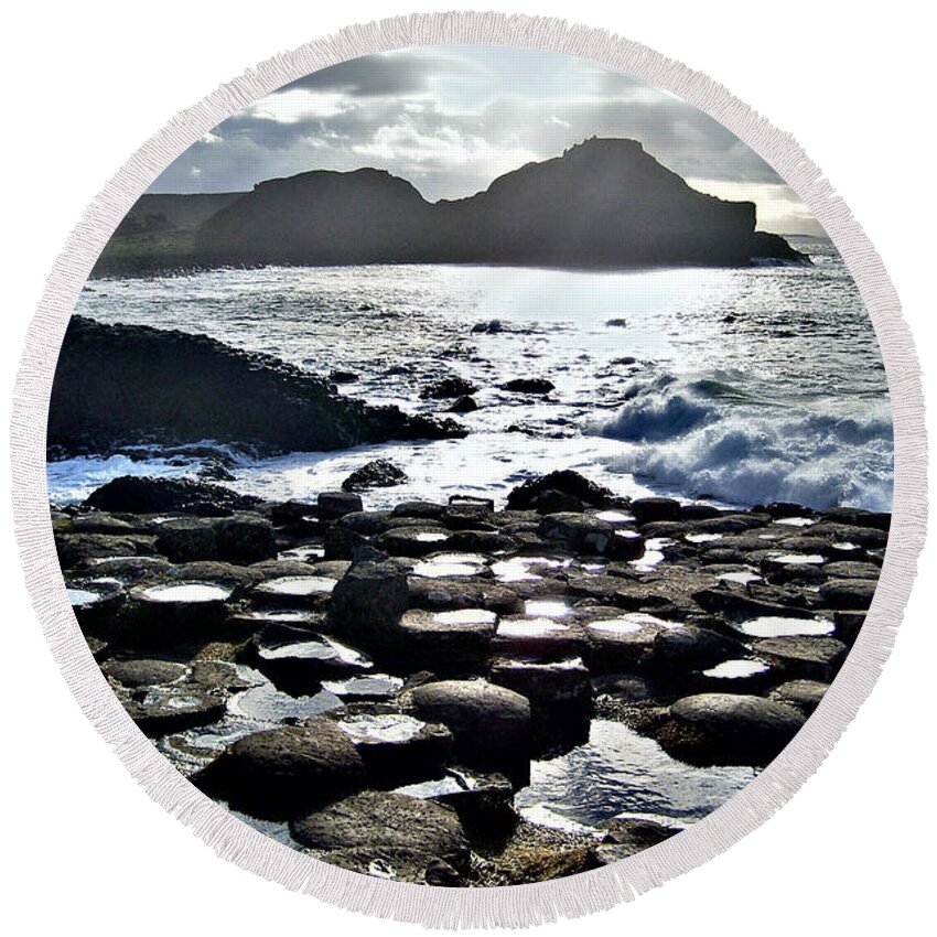 Giant's Causeway Round Beach Towel featuring the photograph Giant's Causeway sunset by Nina Ficur Feenan