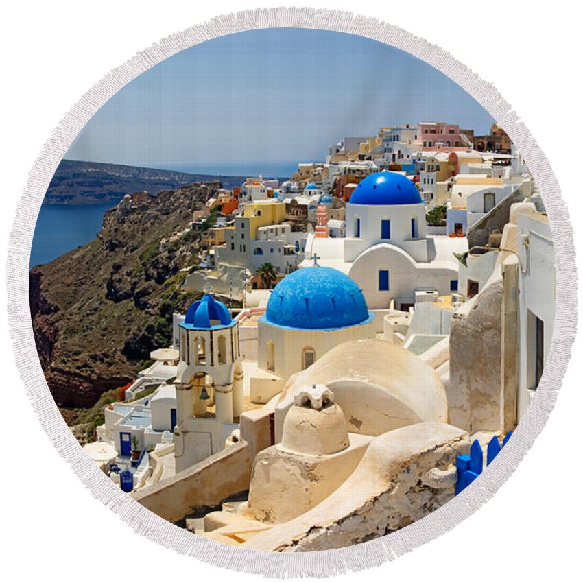 Photography Round Beach Towel featuring the photograph High Angle View Of A Church, Oia by Panoramic Images