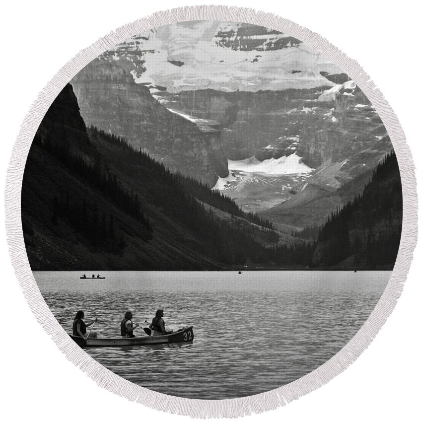 Lake Louise Round Beach Towel featuring the photograph Kayak on Lake Louise by RicardMN Photography