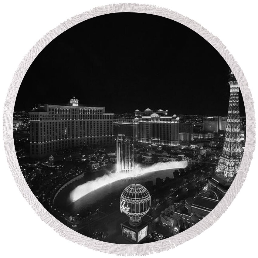 Vegas Round Beach Towel featuring the photograph Las Vegas Strip and Fountains Black and White by Stephanie McDowell