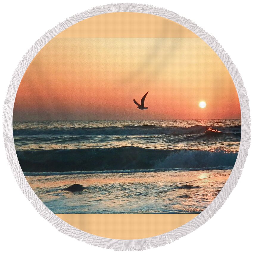 #seagull #lone #flyer #clearwater #beachshore #florida #flaming #redorange #sunset #clearwater #gulfcoast Round Beach Towel featuring the photograph Lone Seagull Sunset Flight by Belinda Lee