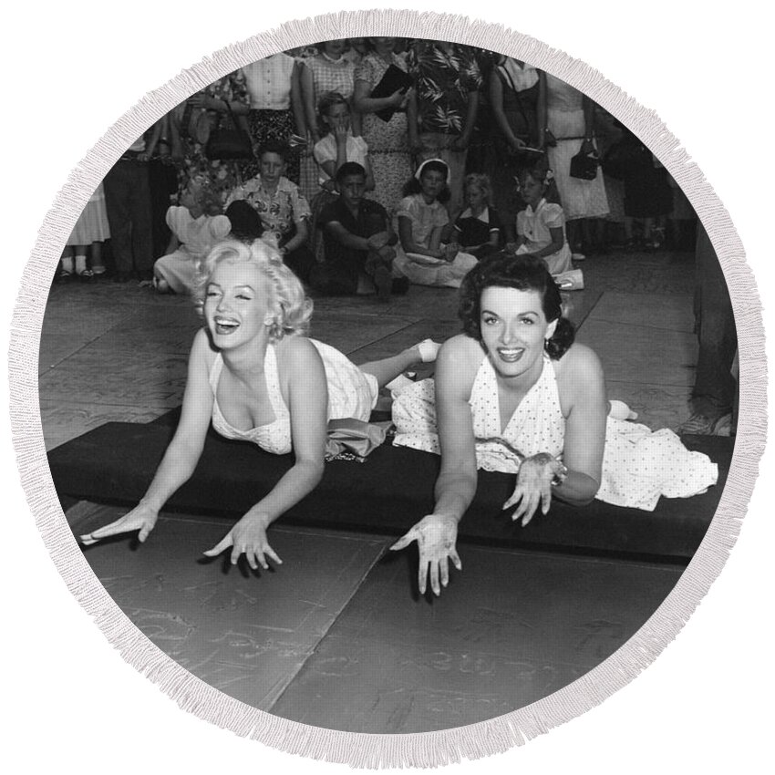 1950's Round Beach Towel featuring the photograph Marilyn Monroe And Jane Russell by Underwood Archives