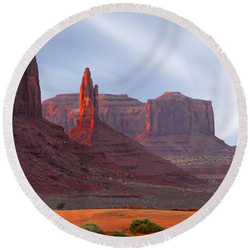Desert Round Beach Towel featuring the photograph Monument Valley at Sunset Panoramic by Mike McGlothlen