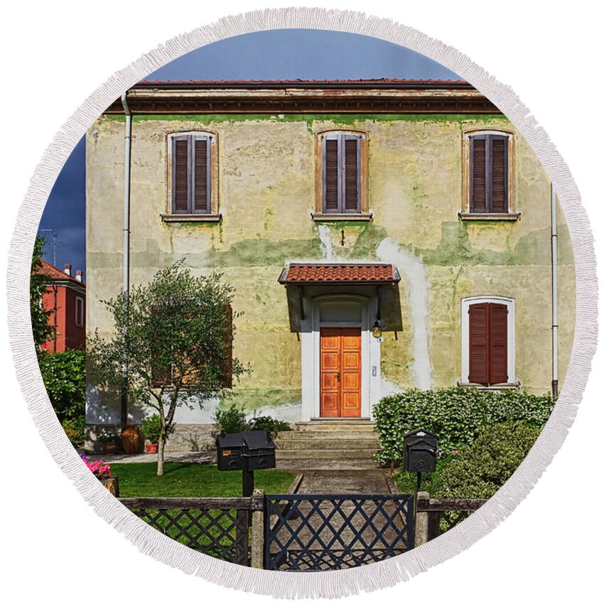 Architecture Round Beach Towel featuring the photograph Old House in Crespi D'Adda by Roberto Pagani