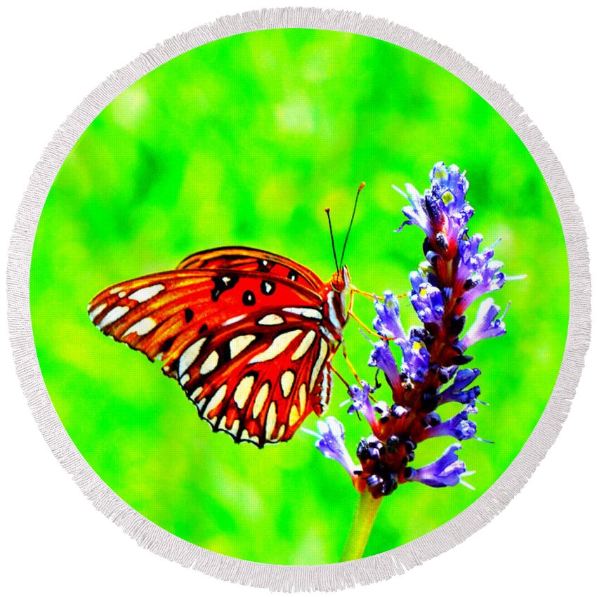 Butterfly Round Beach Towel featuring the photograph Orange Butterly Against A Funky Green Background by Renee Trenholm