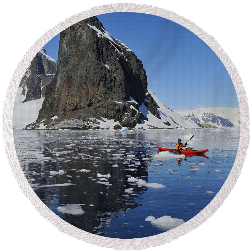 Ice Berg Round Beach Towel featuring the photograph Paddling Through Ice by Tony Beck