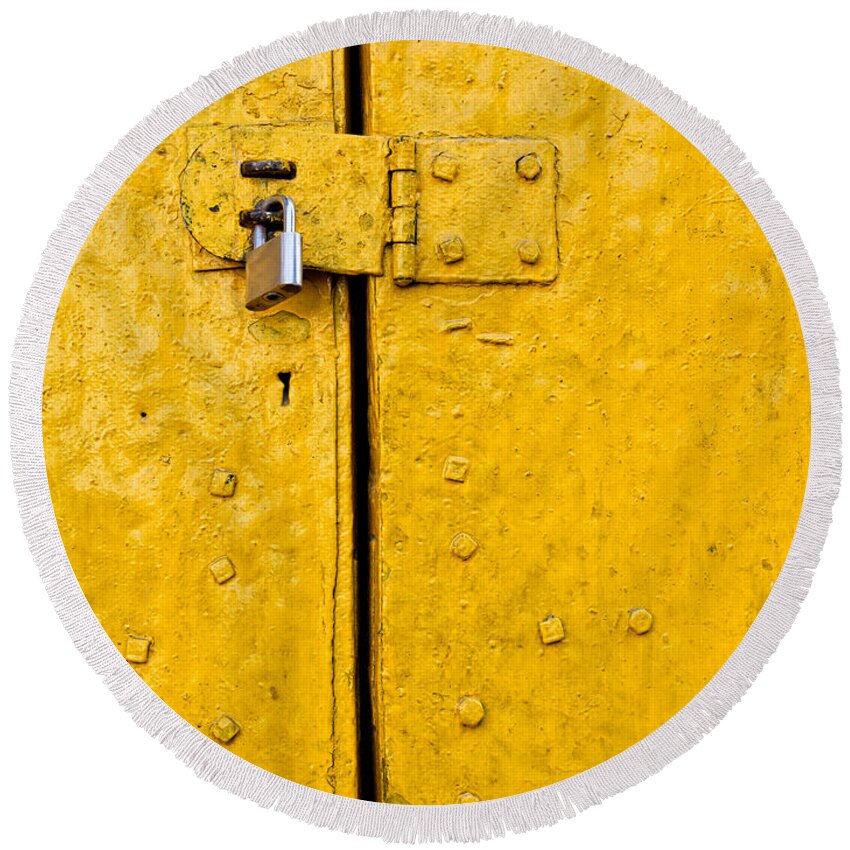 Padlock Round Beach Towel featuring the photograph Padlock on an old yellow door by Dutourdumonde Photography