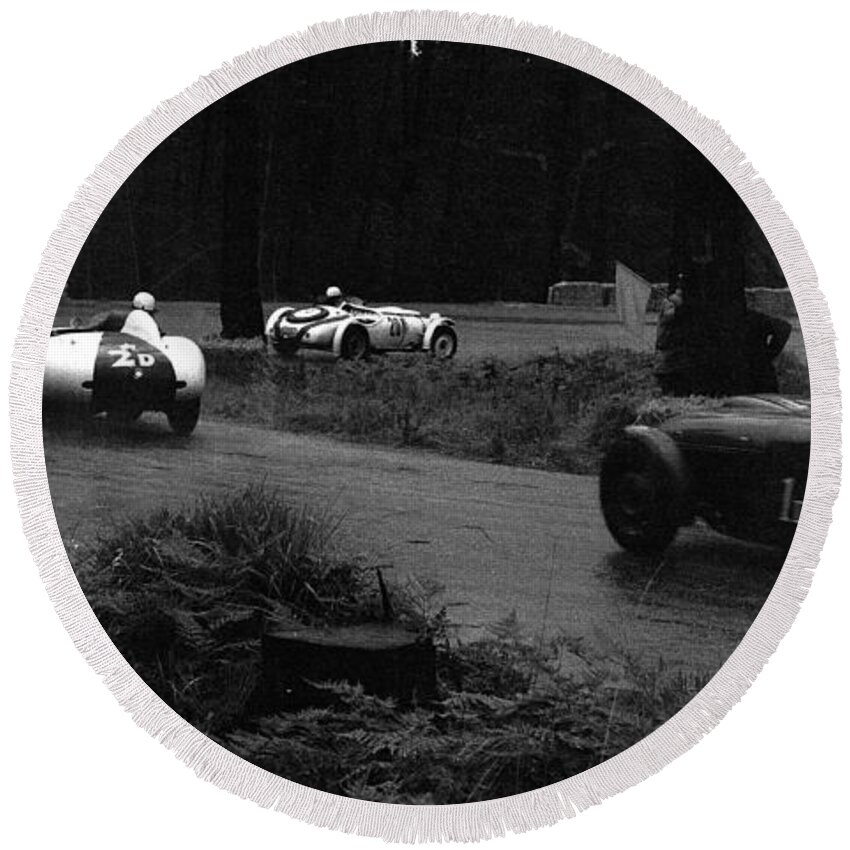 Phil Hill Round Beach Towel featuring the photograph Phil Hill and Bill Pollack at Pebble Beach Road Races in 1955 by Robert K Blaisdell