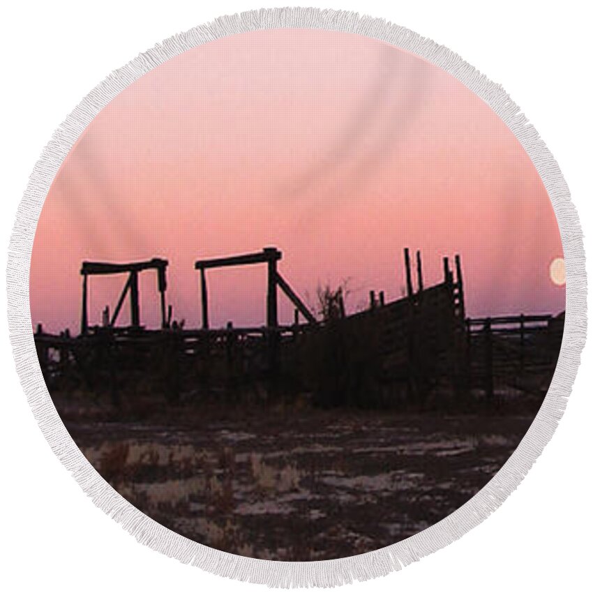 Corrals Round Beach Towel featuring the photograph Pink sunset over corral by Cathy Anderson