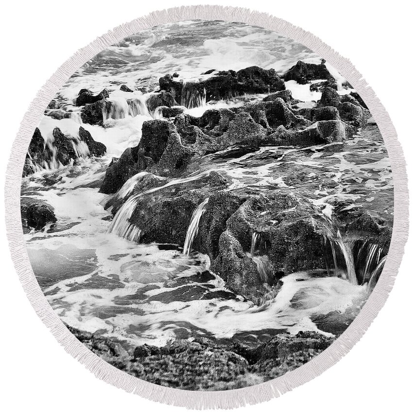 Water And Rock Photographs Round Beach Towel featuring the photograph Pouring Rocks by David Davies