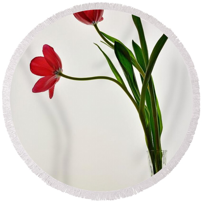 Flower Round Beach Towel featuring the photograph Red Flowers in Glass Vase by Phyllis Meinke
