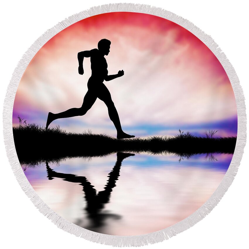 Running Round Beach Towel featuring the photograph Silhouette of man running at sunset by Michal Bednarek