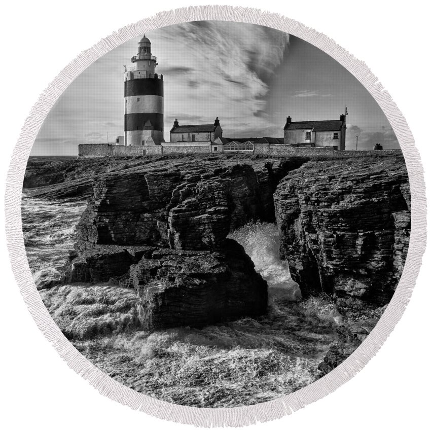 Hook Round Beach Towel featuring the photograph Stormy day at Hook Head Lighthouse by Nigel R Bell