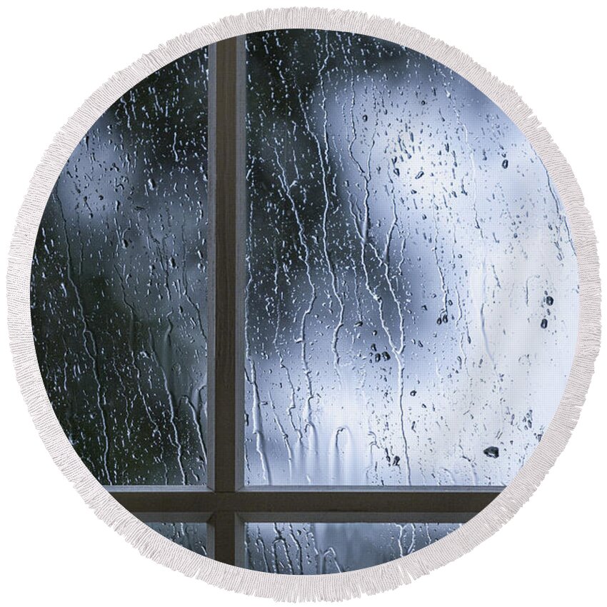 Window; Mullions; Paint; Painted; Rural; Trees; Country; Green; Blue; Teal; Rain; Raining; Rainy; Architecture; View; Protection; Dark; Darkness; Mysterious; Mystery; Crime; Thriller; Foreboding; Shadows; Serene; Inside; Indoors; Safe; Safety; Storm; Stormy; Storming; Pane; Multiple Round Beach Towel featuring the photograph Stormy Night by Margie Hurwich