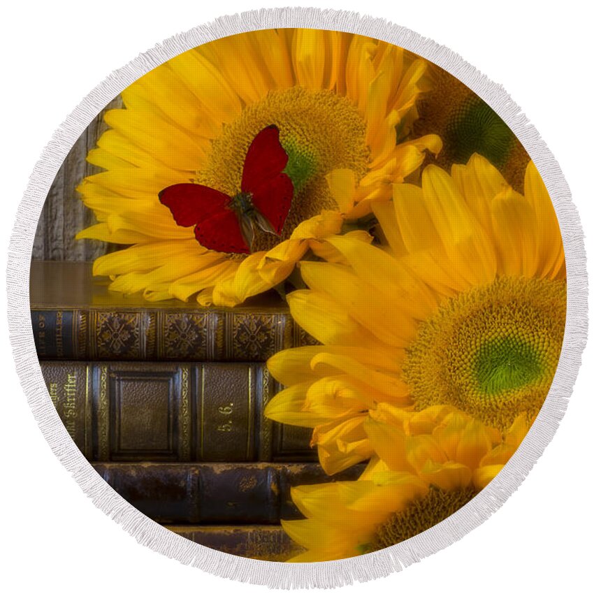 Sunflowers Round Beach Towel featuring the photograph Sunflowers and old books by Garry Gay