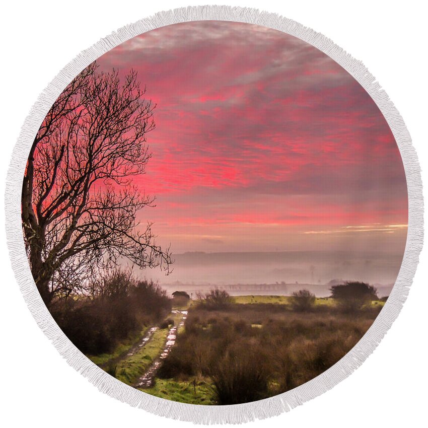 Ireland Round Beach Towel featuring the photograph Sunrise over Decomade Pasture in County Clare by James Truett