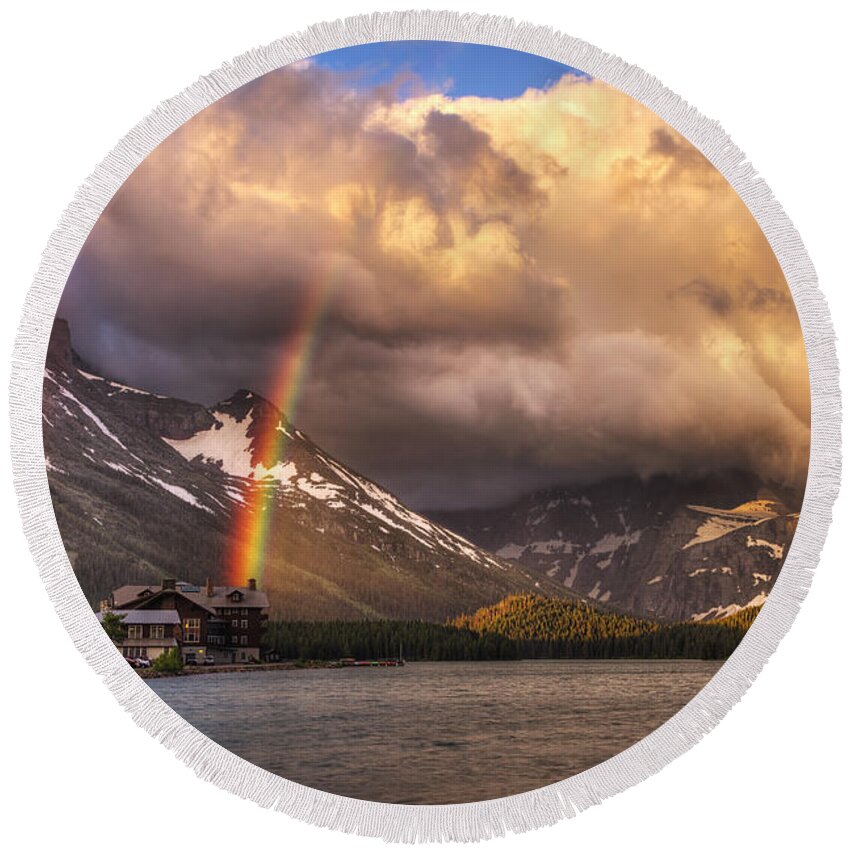 Many Glacier Hotel Round Beach Towel featuring the photograph Sunrise Rainbow by Mark Kiver