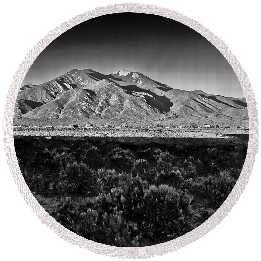 Taos Round Beach Towel featuring the photograph Taos in black and white X by Charles Muhle