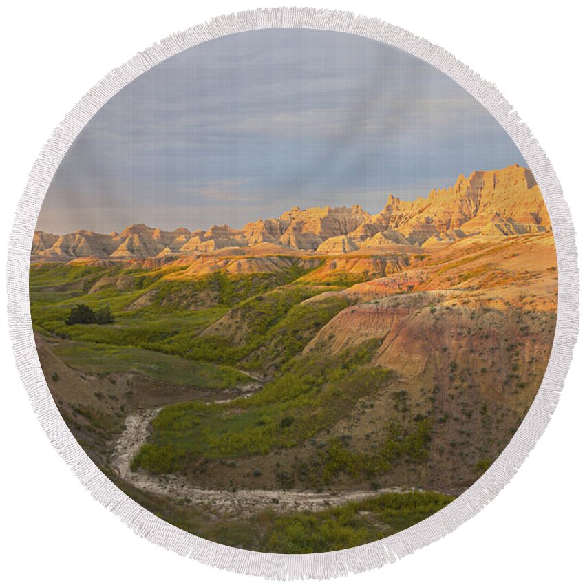 Badlands Round Beach Towel featuring the photograph The Stream by Steve Triplett