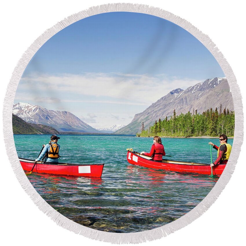 Activity Round Beach Towel featuring the photograph Three Kayakers Paddle In Kathleen Lake by Dan Barham