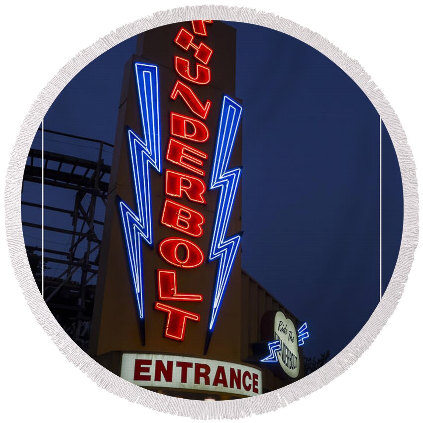 Amusement Round Beach Towel featuring the photograph Thunderbolt Rollercoaster Neon Sign by Edward Fielding
