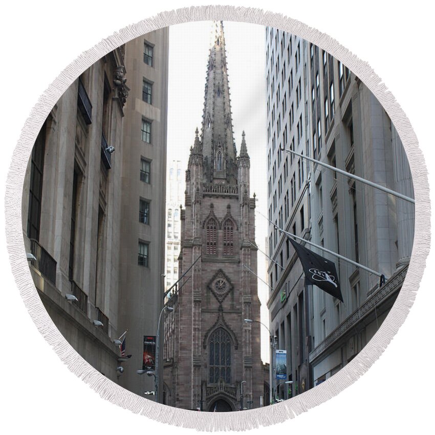 Wall Street Leading To Trinity Church Round Beach Towel featuring the photograph Wall Street leading to Trinity Church by John Telfer