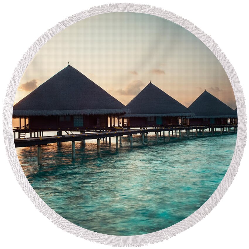 Amazing Round Beach Towel featuring the photograph Waterbungalows At Sunset by Hannes Cmarits