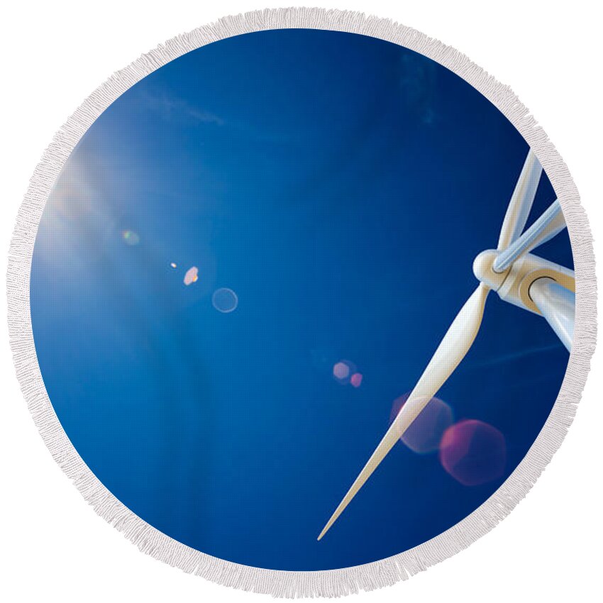 Wind Round Beach Towel featuring the photograph Wind Turbine and sun by Johan Swanepoel