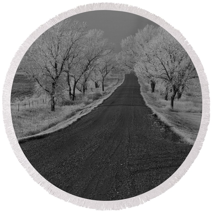 Winter Round Beach Towel featuring the photograph A Rural Winter's Road by Steve Triplett