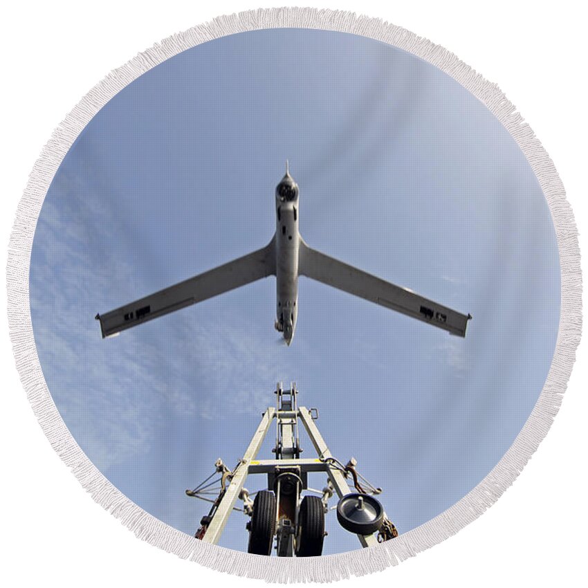 Scaneagle Round Beach Towel featuring the photograph A Scaneagle Unmanned Aerial Vehicle #1 by Stocktrek Images