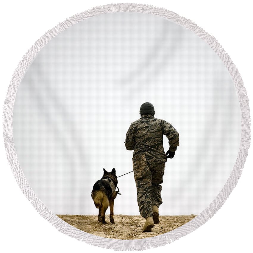 Operation Enduring Freedom Round Beach Towel featuring the photograph A Dog Handler And His Military Working #5 by Stocktrek Images