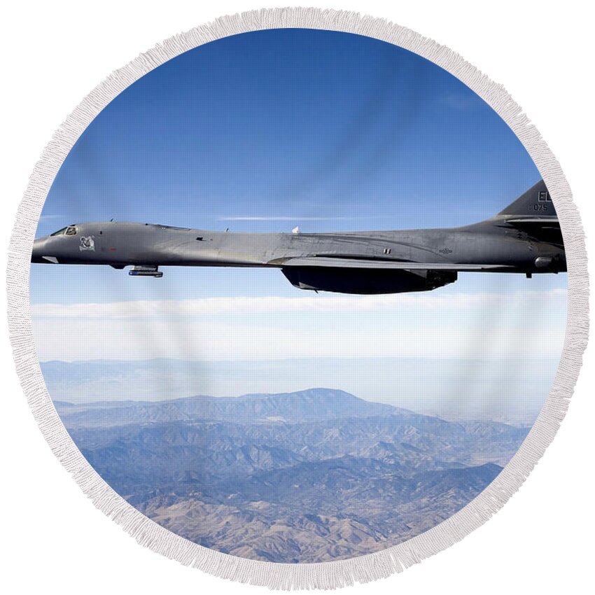 B-1 Lancer Round Beach Towel featuring the photograph A B-1b Lancer Carries The Sniper Pod by Stocktrek Images