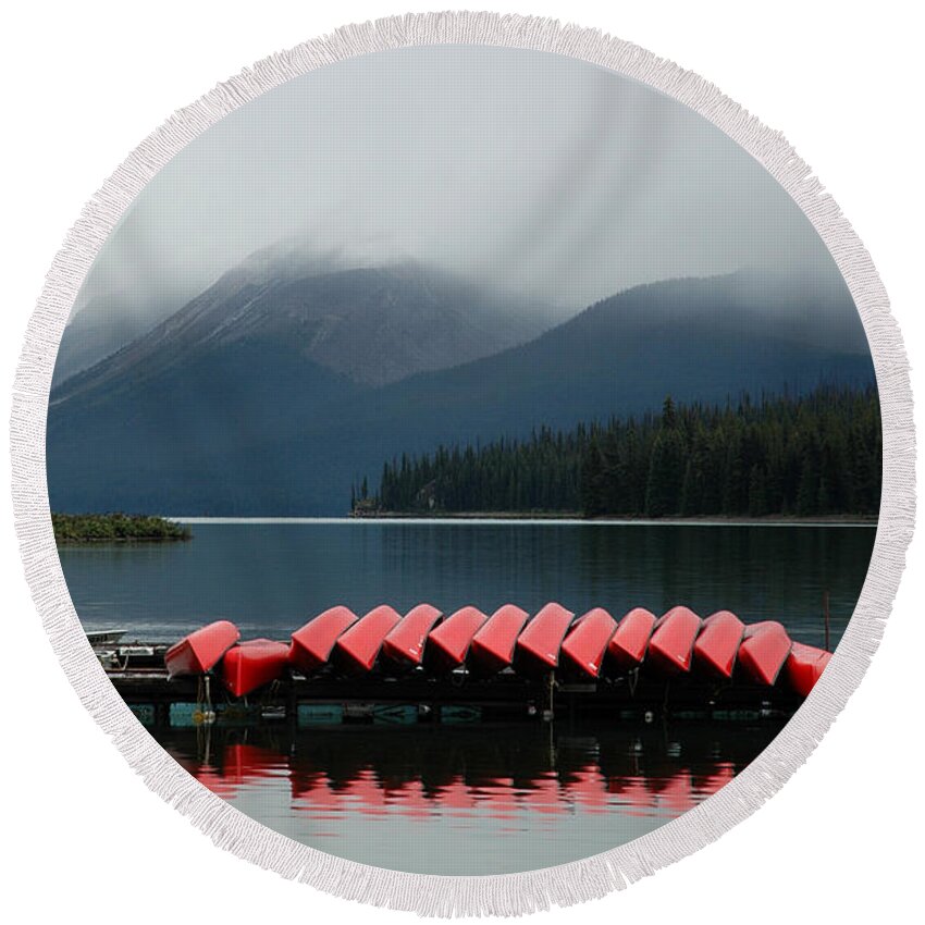 Rain Round Beach Towel featuring the photograph Canoes on Maligne Lake by Vivian Christopher