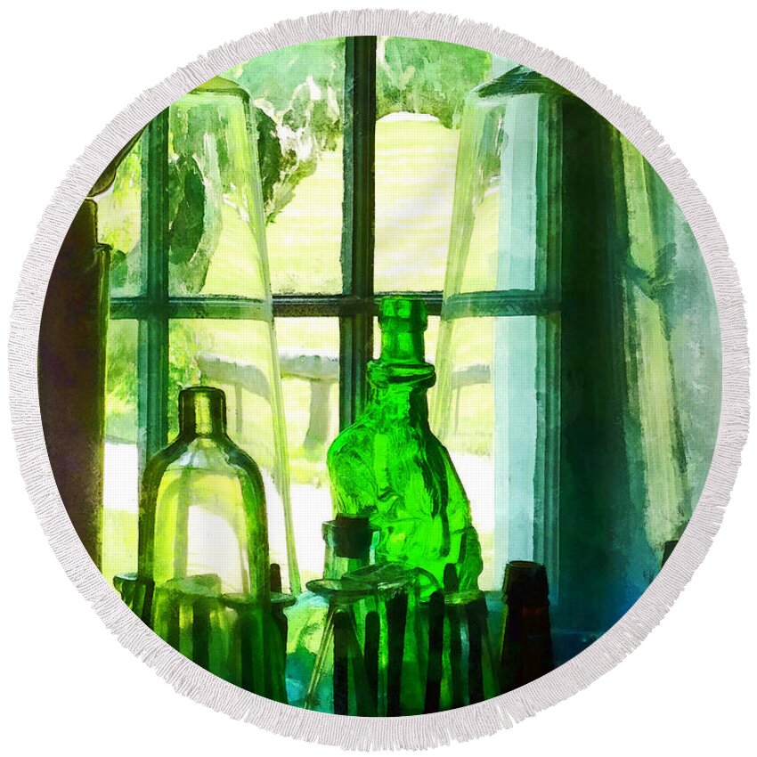 Bottles Round Beach Towel featuring the photograph Green Bottles on Windowsill by Susan Savad