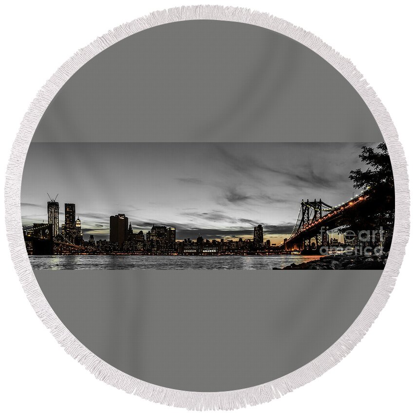 Manhattan Round Beach Towel featuring the photograph New Yorks skyline at night colorkey by Hannes Cmarits