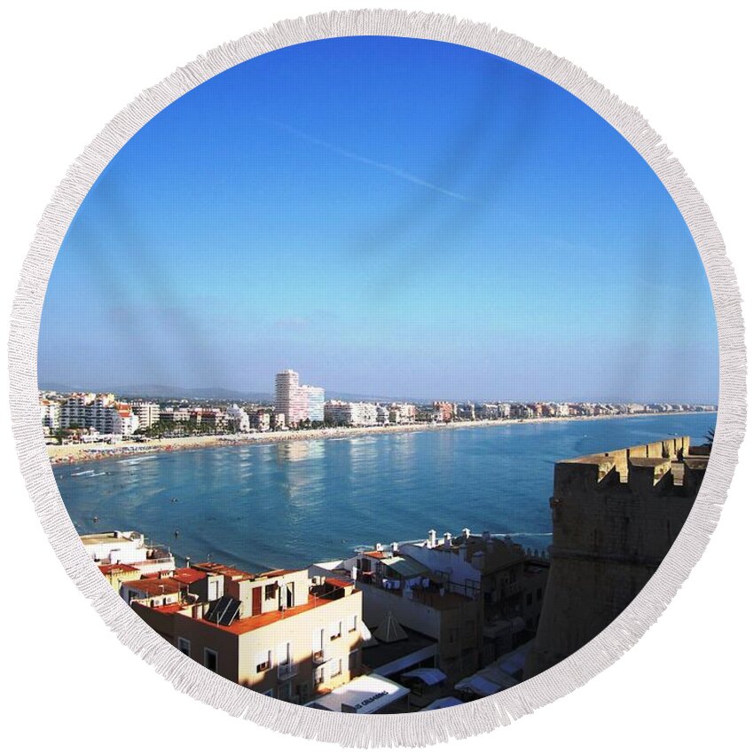 Peniscola Round Beach Towel featuring the photograph Peniscola Beach Panoramic View Water Reflection At the Mediterranean Water Front Homes in Spain by John Shiron