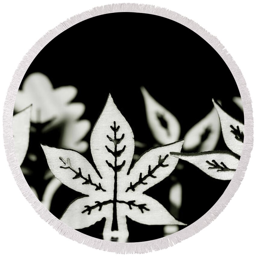 Leaf Round Beach Towel featuring the photograph Wooden leaf shapes in black and white by Simon Bratt