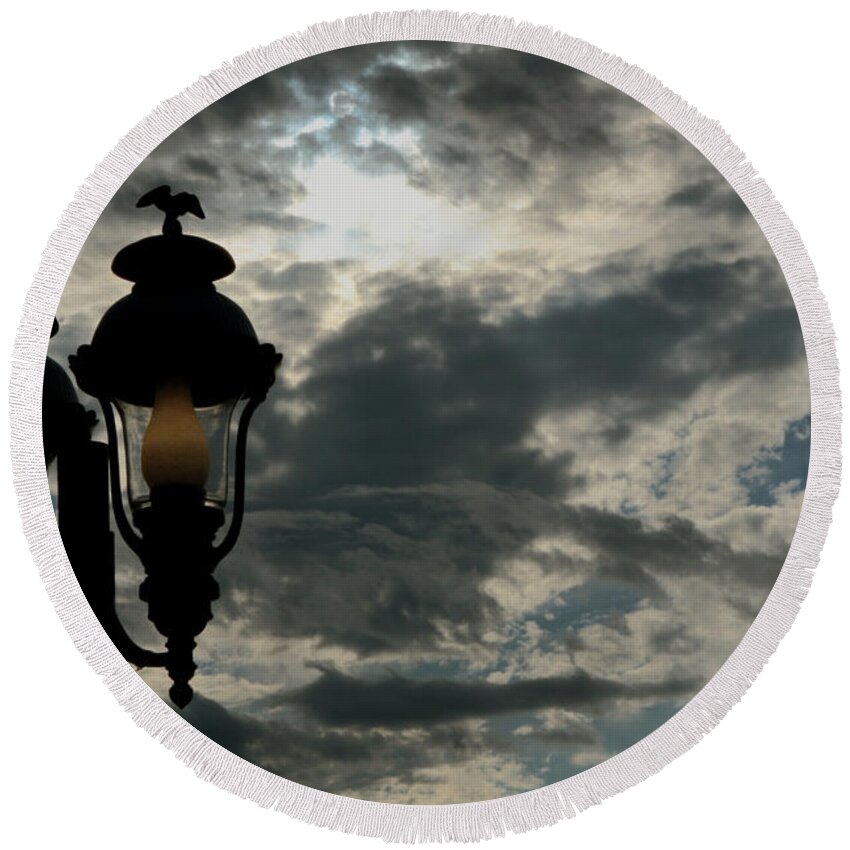 Light Post Round Beach Towel featuring the photograph Yellow Light Against Cloudy Sky by Lorraine Devon Wilke