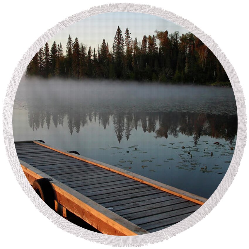 Mist Round Beach Towel featuring the digital art Morning mist over Lynx Lake in Northern Saskatchewan #1 by Mark Duffy