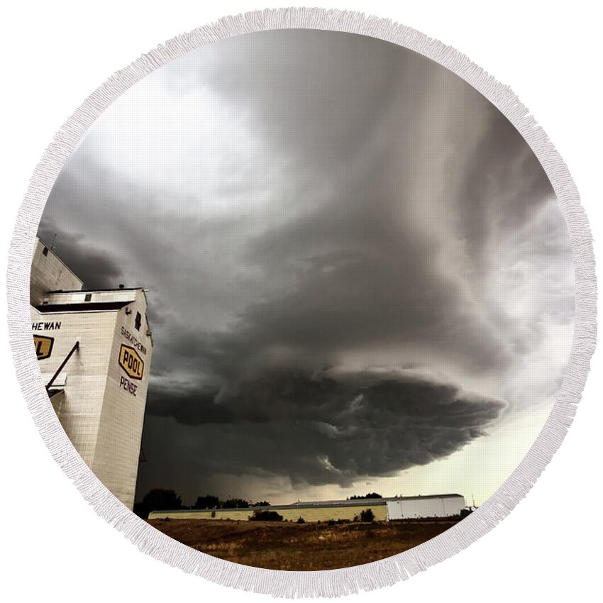 Grain Elevator Round Beach Towel featuring the digital art Nasty looking cumulonimbus cloud behind grain elevator #1 by Mark Duffy