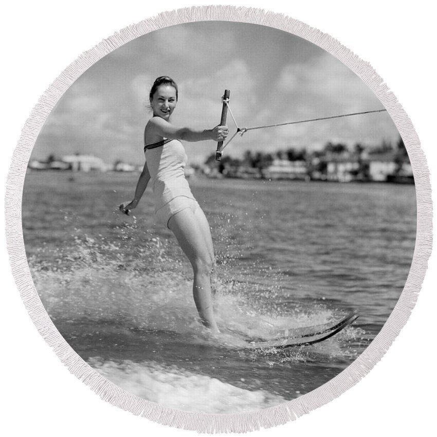 1950s Round Beach Towel featuring the photograph Woman Water Skiing #1 by H. Armstrong Roberts/ClassicStock