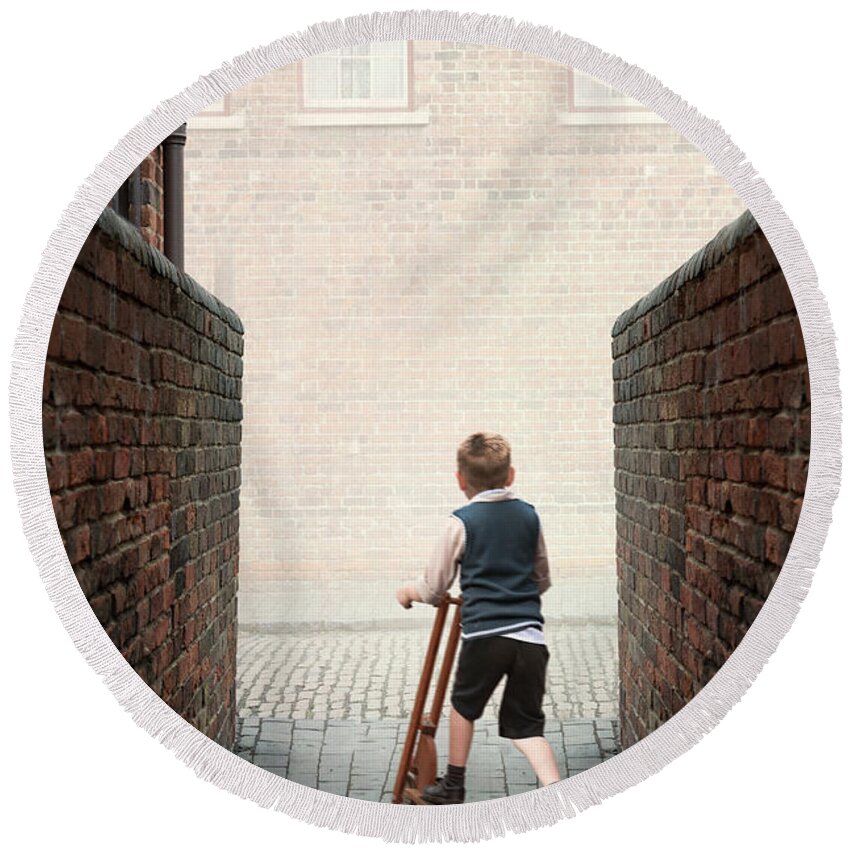 1940s Round Beach Towel featuring the photograph 1940s Boy With A Wooden Scooter by Lee Avison
