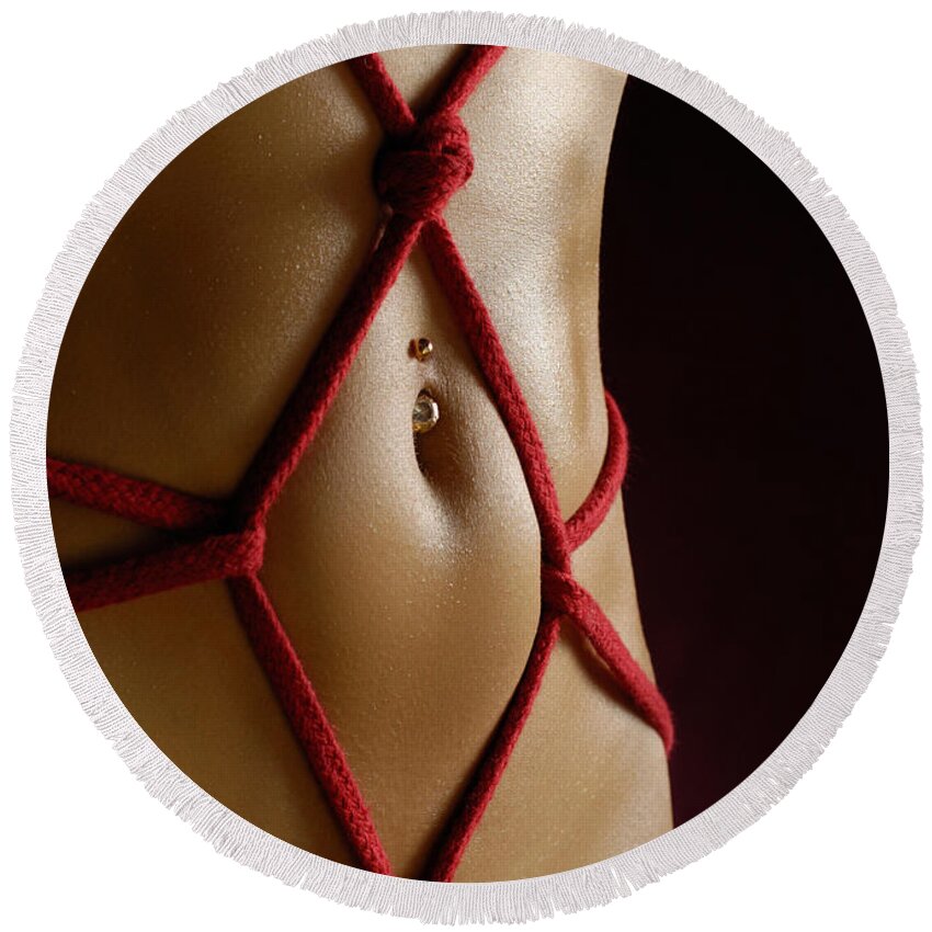 Bondage Round Beach Towel featuring the photograph Closeup of a Stomach with Decorative Rope Bondage Shibari by Maxim Images Exquisite Prints