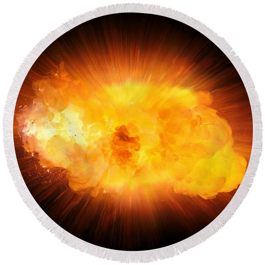 Fire Round Beach Towel featuring the photograph Realistic fire explosion, orange blast with sparks isolated on black background #3 by Lukasz Szczepanski
